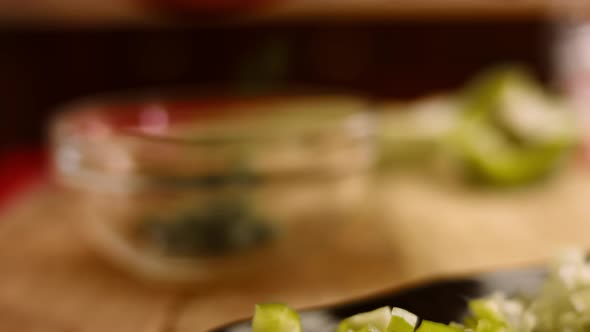 Woman's Hands Cutting Piattoni Frozen Green Beans Close Up