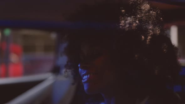 Woman With Afro Hair In Ferrari 348 TB At Night