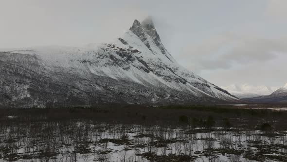 Aerial drone pulls back, Otertinden Mountain, Signaldalen, Signal Valley, Norway.