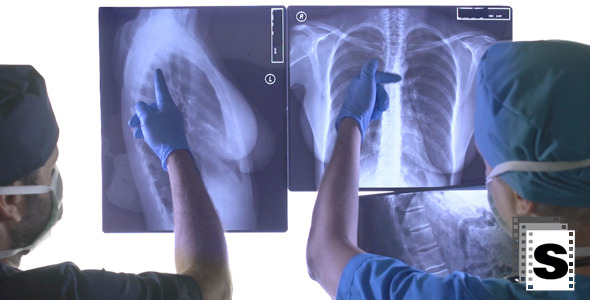Surgeons Examining X-rays