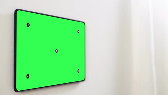 Chroma Key Green Screen on Tablet Pc at Smart Home