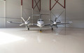 Small aircraft parked in a hangar - PhotoDune Item for Sale