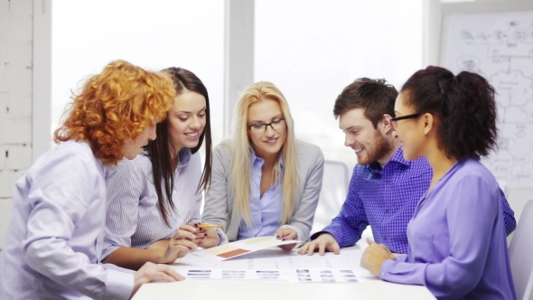 Happy Creative Team Meeting At Office