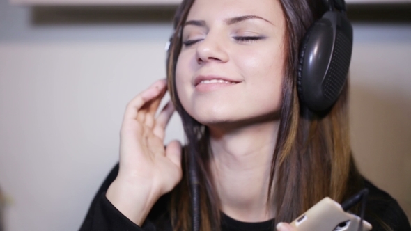 Girl In Headphones Smile
