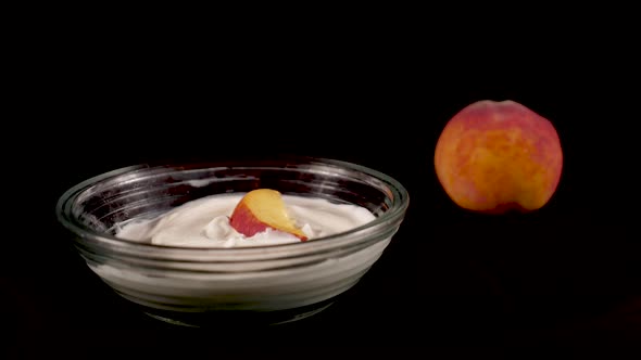 Peach Fruit with Cream on a Black Background alt