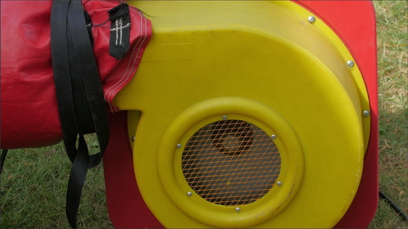 A Red Blower Used to Inflate the Zorb Ball alt
