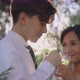 Slow motion Asian Bride And Groom Enjoying Champagne On Their Wedding Celebration. - VideoHive Item for Sale