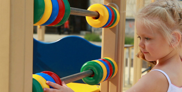 Mother and Daughter On Playground