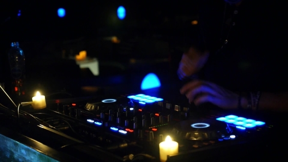 DJ Hand On Mixing Console In Night?lub On Party