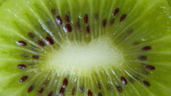 Macro Rotation Video Shooting of Slice Kiwi Fruit, Close Up Flesh of Kiwi
