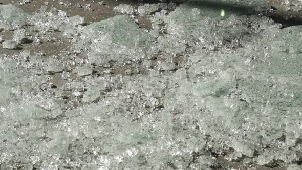 Fragments Of Tempered Glass Crumble On The Floor
