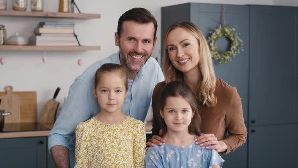 Portrait of caucasian family over easter dinner table. Shot with RED helium camera in 8K.