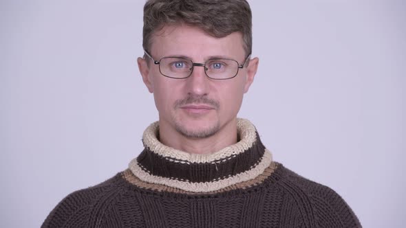 Face of Handsome Bearded Man with Eyeglasses Ready for Winter