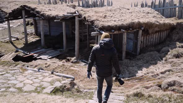 Photographer With Camera In Viking Village