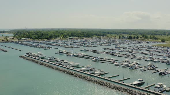 Aerial Drone Shot of Yacht and Sailboats Moored at the Quay