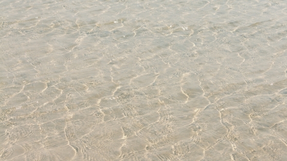 Beach Yellow Sand And Turquoise Shallow Water