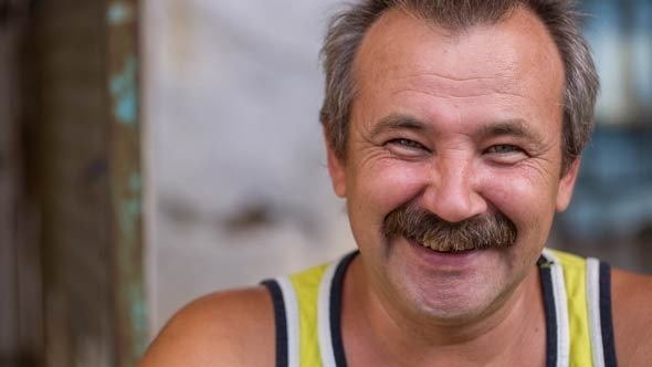Portrait of Cheerful Rural Man With Mustaches