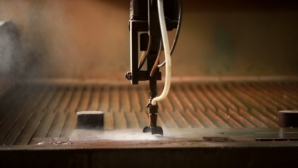 Cutting Metal By Using Of Water Jets And Sand