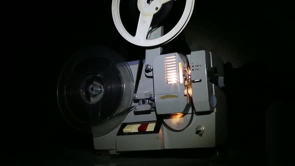 Old Projector Showing Film - Dolly Shot 1 alt