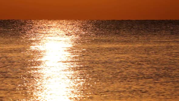 Reflection Of Sunrise Over The Sea 3