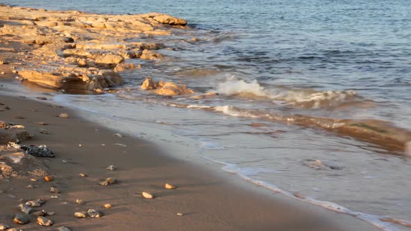 Sea Water Waves And Sand Beach  Stones