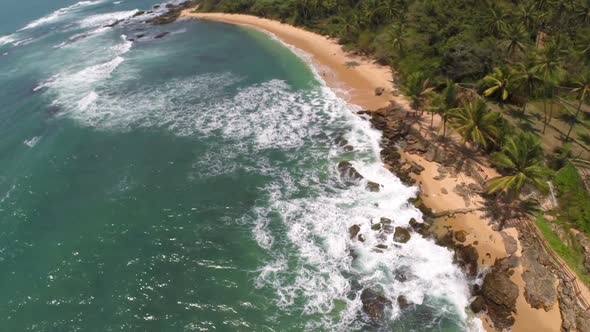 Flying Over Sea Waves On Tropical Beach