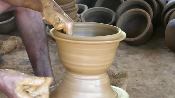 Hands Of A Potter Manufactured A Pot Of Clay 3 alt