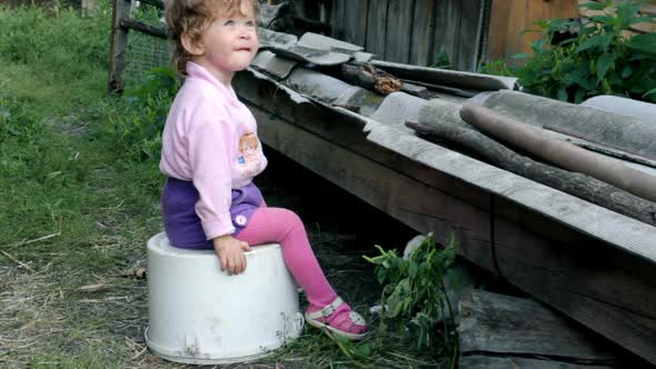 Little Kid Playing  Puppies 2