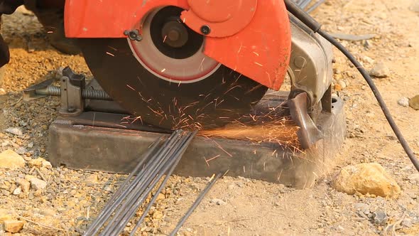 Worker Cutting Steel For House Building 2