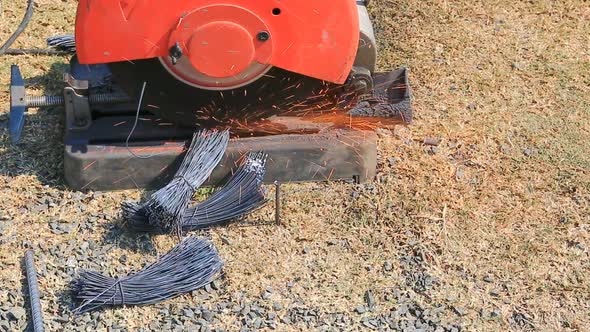 Worker Cutting Steel For House Building 3