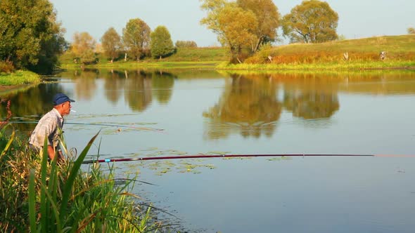 Fishing Senior On Autumn Lake 2 alt