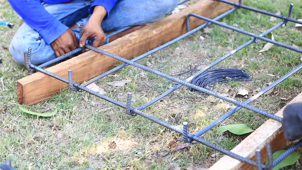 Worker Bending And Bundle Steel For Construction Job 7 alt