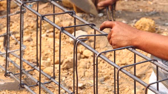 Worker Bending And Bundle Steel For Construction Job 3 alt