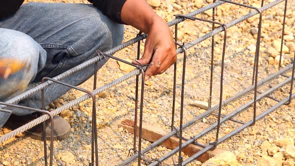 Worker Bending And Bundle Steel For Construction Job 5