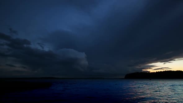 Approaching Storm On Lake After Sunset -  Clouds And Realtime Water