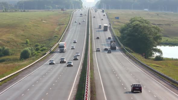 Cars traveling on The Highway alt
