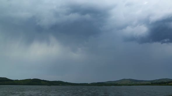 Approaching Storm - Storm Clouds Over Lake -