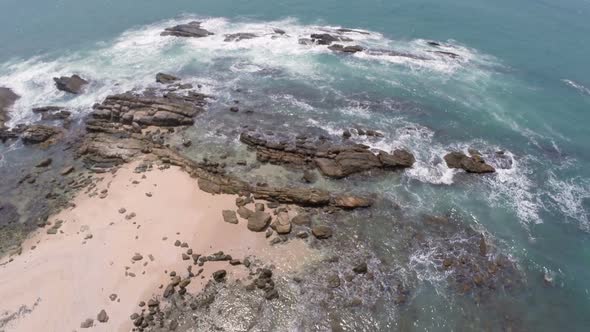 Flying Over Sea Waves And Stones 2