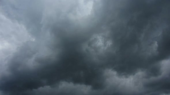 Dark Storm Clouds Are Moving Fast At Viewer -
