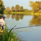 Fishing Senior Couple On Autumn Lake - VideoHive Item for Sale