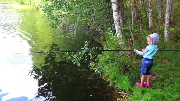 Fishing Littlle Girl  Rod On Forest Lake