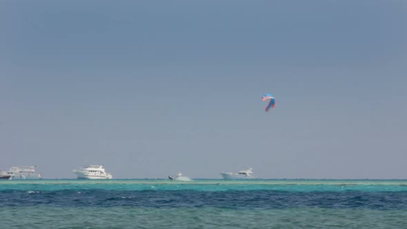 Kite Surfing - Surfers On Blue Sea Surface 1