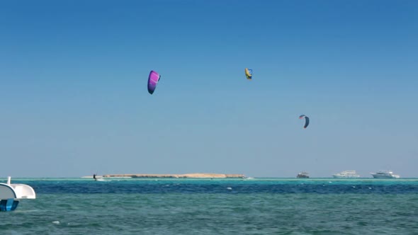 Kite Surfing - Surfers On Blue Sea Surface 2