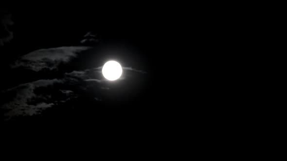 Moon Moving Between Clouds 5