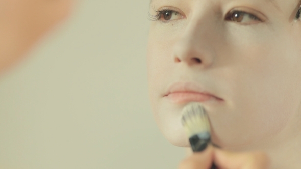 Makeup Artist Apply On Face Of Model White Makeup