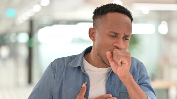 Portrait of Sick Casual African Man Coughing