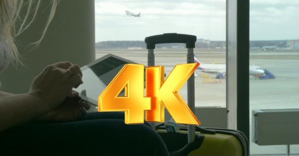 Woman Waiting For The Flight With Tablet PC