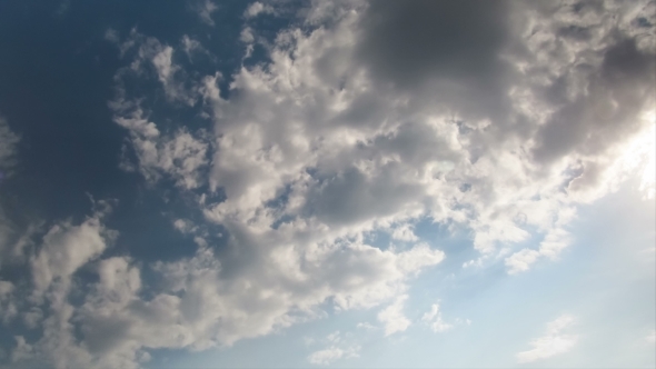 Clouds Moving In The Blue Sky alt