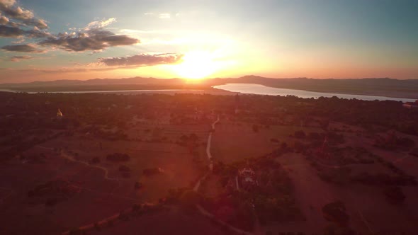 Flying Over Temples in Bagan at Sunset