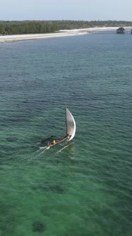 Vertical Video Boats in the Ocean Near the Coast of Zanzibar Tanzania